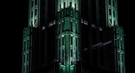 Fototapeta premium Art Deco Skyscraper at Night, Illuminated Facade