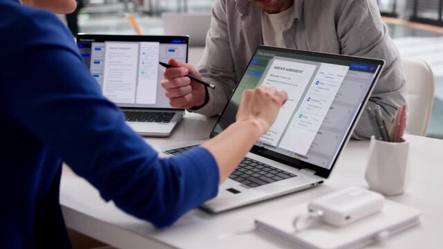 Archivist Carefully Organizing Records On Computer