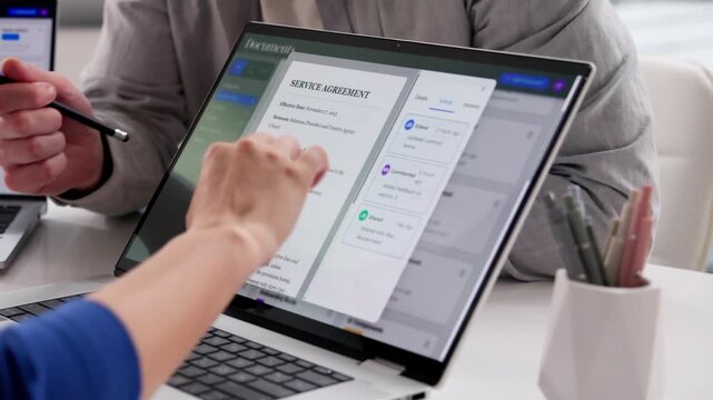 Archivist Carefully Organizing Records On Computer