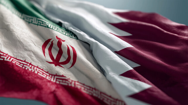 iranian and qatari flag waving together. relations between iran and qatar
