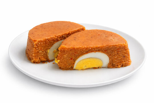 Nigerian Moi Moi Steamed Bean Pudding with Egg on White Background