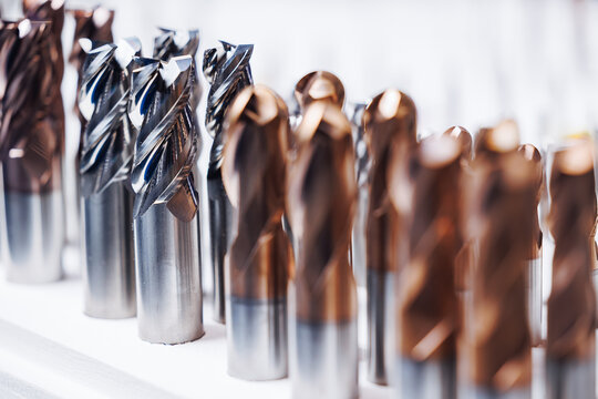 Close-up of cnc machine drill bits with metallic finishes