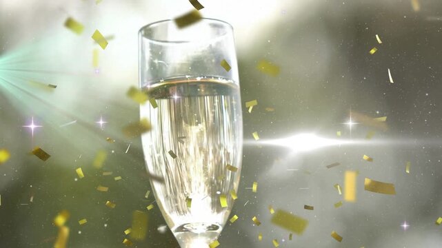 Animation of stars and confetti over hand with glass of champagne
