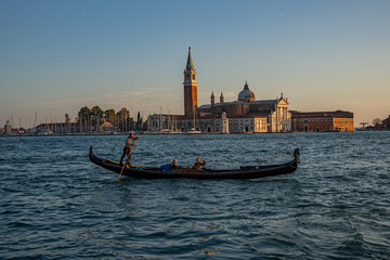 Obraz premium The photograph depicts St Mark's Square (Piazza San Marco) in Venice. Dominating the square is the bell tower (Campanile di San Marco)