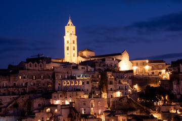 Obraz premium The Cathedral of Matera rises above the Sassi, a Romanesque crown of stone watching over centuries of history.