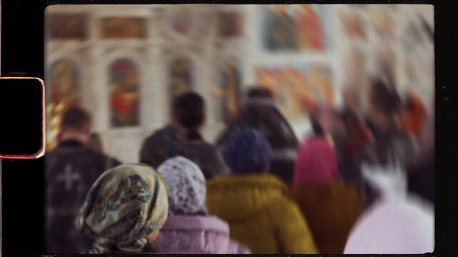 Orthodox church congregation praying during divine liturgy