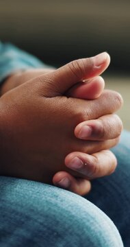 Child, hands and nervous with anxiety, mental health or ADHD for autistic behaviour or stress. Closeup, kid or person with depression or playing with fingers for coping mechanism or disorder on sofa