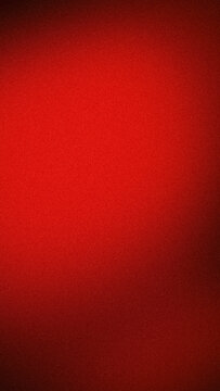 Vibrant red grainy gradient background with deep crimson shadows and bright scarlet light