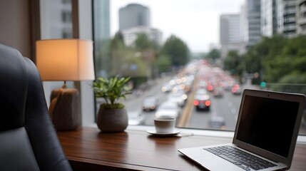 Fototapeta premium Modern office desk with laptop coffee and lamp overlooking a busy city street view