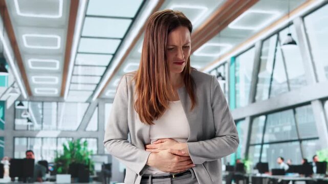 Woman With Stomach Pain And Inflammation