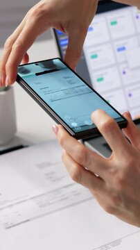 OCR Specialist Using Mobile Phone To Scan