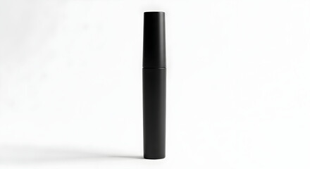 Obraz premium Close-up of sleek black matte lipstick tube standing vertically on white background