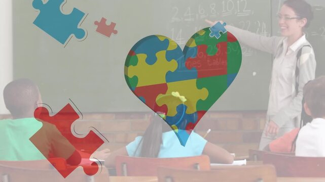 Animation of puzzle and heart over diverse schoolchildren with teacher