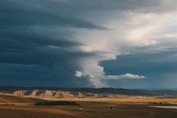 Obraz premium Storm clouds gathering over a vast desert landscape with distant mountains and flat plains