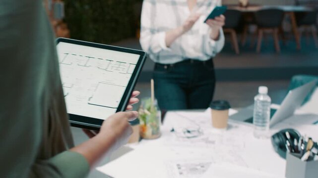 Evening, hands and tablet screen with architect people in office for collaboration or planning. Building plans, construction and late with architecture team in workplace boardroom for discussion