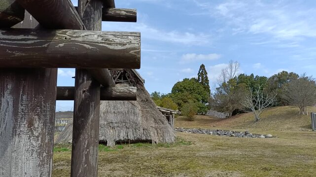 Ancient Japanese dwellings and wooden structure from Jomon and Yayoi periods, historical rural landscape