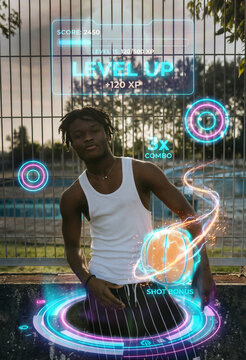 Young man interacting with gamified basketball interface showing score and level progress