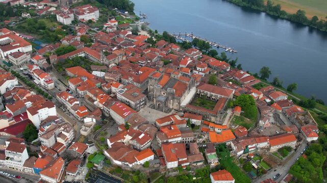  Aerial panoramic view beside the old town of  the city Tui in Spain on a cloudy summer noon.