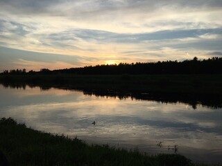 Fototapeta premium sunset over the river