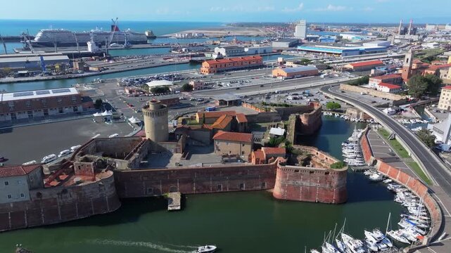 old fortress still at the canal entrance for the Italian city of Livorno, landmark that has protected the maritime interests of Tuscany for ages