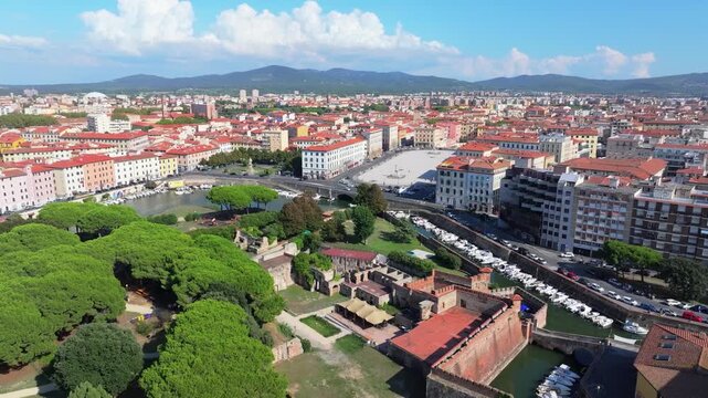 partial orbit of outer eastern Livorno Italy near old fort until hill country in interior Tuscany