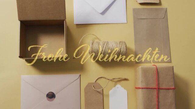 Animation of frohe weihnachten text over envelopes and strings