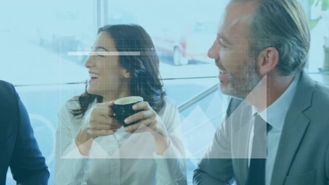 Business professionals laughing over coffee with data processing animation overlay