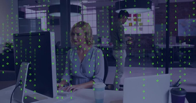 Office co?workers typing on computer and arranging sticky notes in tech with floating graphs