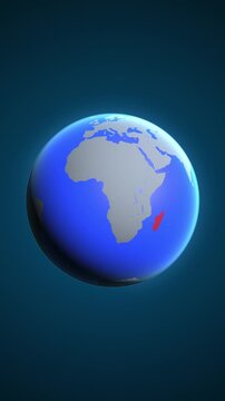 The animation shows a graphic representation of the earth and highlights the location and map of Madagascar colored red in vertical format.