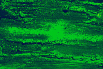 Fototapeta premium Abstract neon green texture with rough surface and grunge details. Bright toxic background with organic patterns, bold color and futuristic cyberpunk feel.