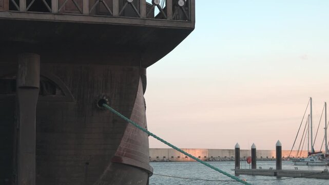 Old galleon ship at sunset