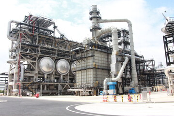 Fototapeta premium Large Petrochemical Refinery Plant With Reactors And Piping