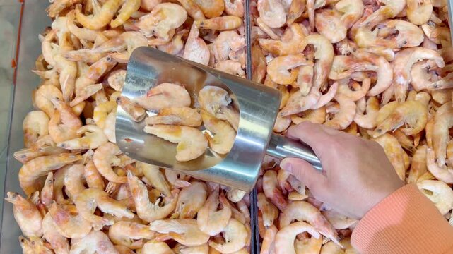 Buying shrimps at the grocery store	