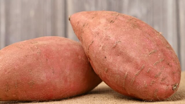 video of a raw sweet potato