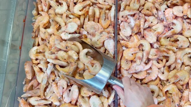 Buying shrimps at the grocery store	