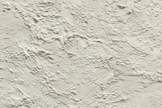 Pale sage microcement texture, minimalist seamless wall surface