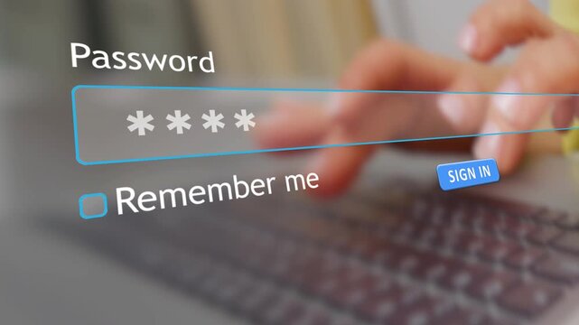 A user types their password in the form box on a website using an internet browser while sitting at a computer desk during the day.
