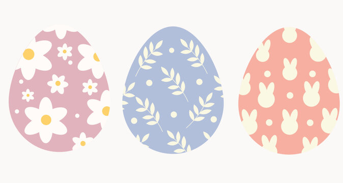 Three decorative Easter eggs with daisy flowers leaves and bunny rabbit patterns