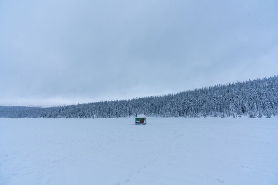 Frozen lake with mountain view