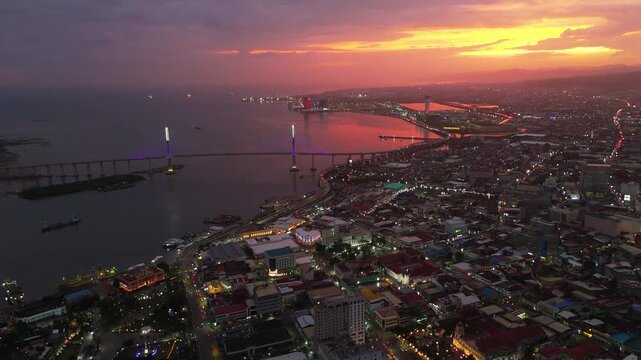 Cebu City, Philippines - Aerial Sunset View with Glowing Urban City Lights