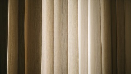 Fototapeta premium Showing layered beige curtains creating soft vertical shadows in bedroom, with sheer panel
