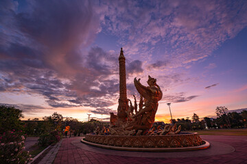 The Golden Garuda Monument at Thung Sri Mueang Public Park. The illuminated monument stands against a dramatic twilight sky and represents Thai mythology, cultural heritage and spirituality © Narong Niemhom