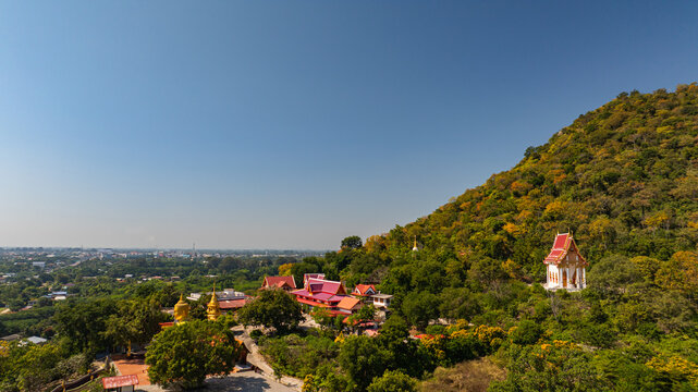 The historic stupa of Wat Phra That Pu Jae in Phrae Province is a centuries old sacred site situated on a mountain. The square chedi enshrines a revered relic of the Buddha and represents