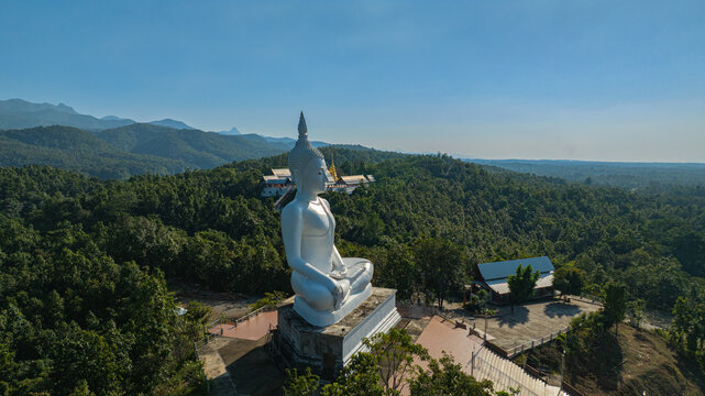 Wat Phra That Pu Jae is a historic mountain temple in Rong Kwang District, Phrae, recognized as a national archaeological site. The ancient square pagoda enshrines a sacred Buddhist relic