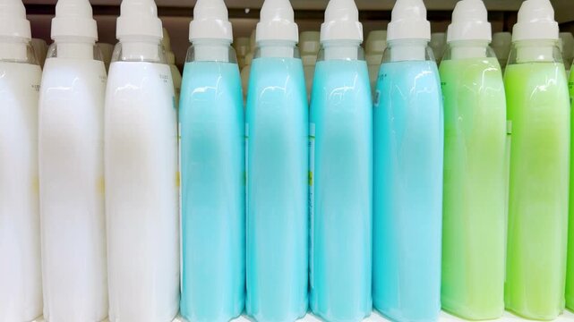 Choosing washing powder ,detergent,liquids at Groceries.