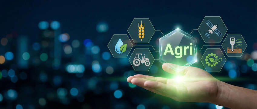 Hand holding glowing agriculture technology icons with futuristic digital farming and smart agri business concepts in dark background