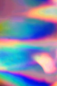 High-quality abstract background featuring vibrant holographic gradients and iridescent light reflections. This colorful texture is perfect for modern web design.