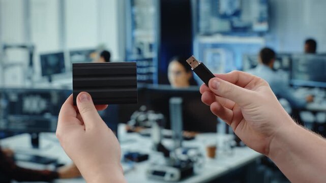 Connecting USB flash drive to power bank in office workspace