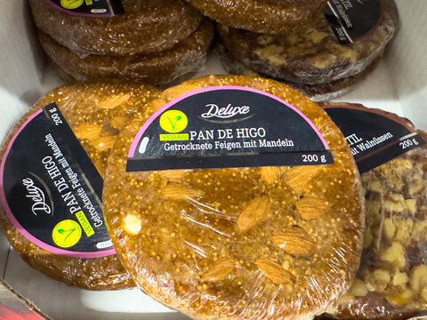 Villach, Austria - March 19, 2026: Packaged Pan de Higo with almonds displayed in a box, featuring labels in German and a visible brand logo