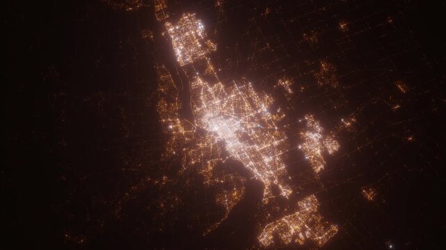 Ottawa (Canada) top view at night. Aerial view on modern city with lights. Camera is flying above the city, moving backward. Vertical video. The north is on the left side
